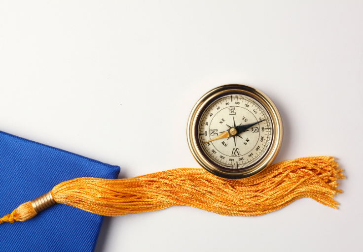 grad cap and compass